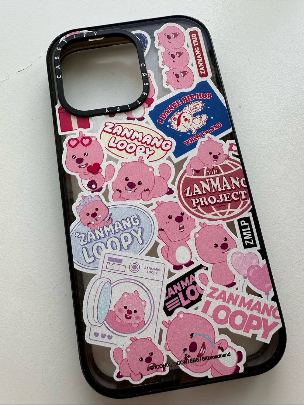 Casetify Loopy Sticker Collage iPhone Case 14ProMax with Black Frame
